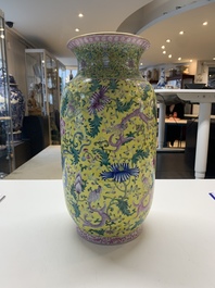 A pair of Chinese famille rose yellow-ground 'dragon' vases, Qianlong mark, Republic