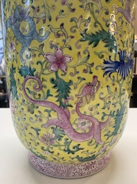 A pair of Chinese famille rose yellow-ground 'dragon' vases, Qianlong mark, Republic