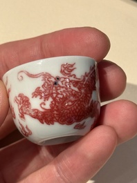 A small Chinese blue, white and copper-red 'dragon' wine cup, Lang Jin Ge Zhi 郎唫閣製 mark, 19/20th C.