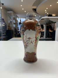 A Chinese famille rose 'mandarin subject' garniture of three vases, Qianlong