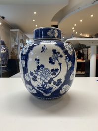 Two Chinese blue and white 'peonies' and 'peonies and antiquities' jars and covers, 19th C.