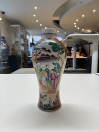 A Chinese famille rose 'mandarin subject' garniture of three vases, Qianlong