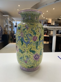 A pair of Chinese famille rose yellow-ground 'dragon' vases, Qianlong mark, Republic