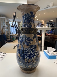 A pair of Chinese Nanking blue and white crackle-glazed 'phoenix' vases, 19th C.