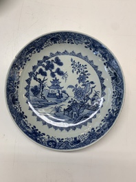 An impressive collection of 25 Chinese blue and white 'landscape' plates, Qianlong