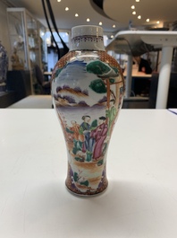 A Chinese famille rose 'mandarin subject' garniture of three vases, Qianlong