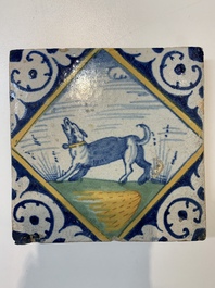 A polychrome Dutch Delft maiolica 'diamond' 'dog' tile, late 16th C.