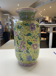 A pair of Chinese famille rose yellow-ground 'dragon' vases, Qianlong mark, Republic