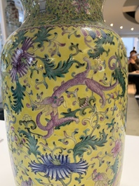 A pair of Chinese famille rose yellow-ground 'dragon' vases, Qianlong mark, Republic