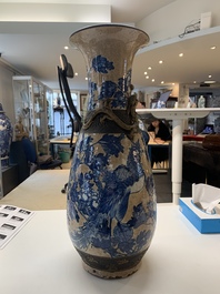 A pair of Chinese Nanking blue and white crackle-glazed 'phoenix' vases, 19th C.