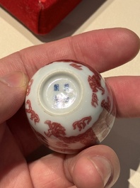 A small Chinese blue, white and copper-red 'dragon' wine cup, Lang Jin Ge Zhi 郎唫閣製 mark, 19/20th C.