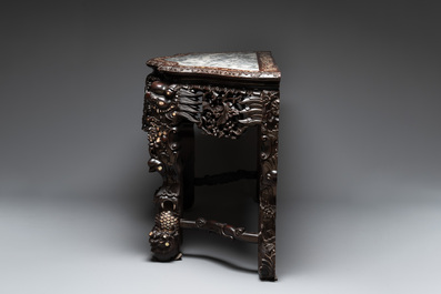 A finely carved Chinese hongmu console table with marble top and mother-of-pearl inlay, Canton, 19th C.
