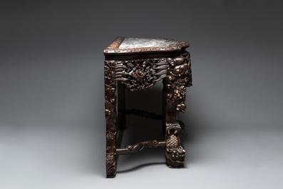 A finely carved Chinese hongmu console table with marble top and mother-of-pearl inlay, Canton, 19th C.