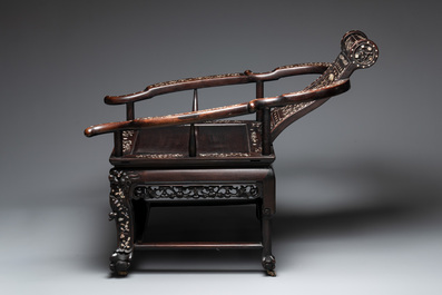 A Chinese mother-of-pearl-inlaid hongmu reclining armchair and retractable footrest, Canton, 19th C.