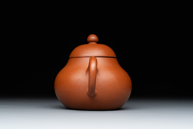 A Chinese Yixing stoneware teapot and cover, signed Mengchen 孟辰, 19th C.