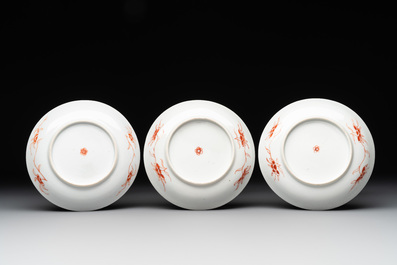 A set of 12 Chinese famille verte cups and saucers with floral design, Kangxi