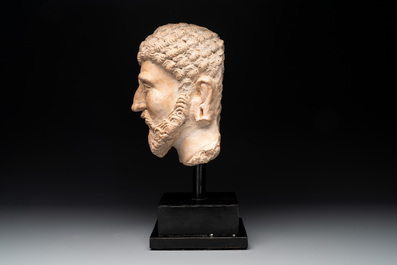 A large terracotta head of a bearded man, Gandhara region, Kushan period, 4/5th C.