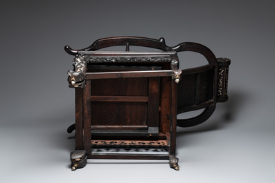 A Chinese mother-of-pearl-inlaid hongmu reclining armchair and retractable footrest, Canton, 19th C.