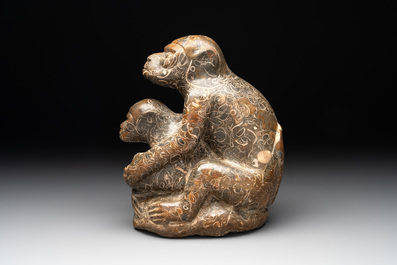 A Chinese stone group of two monkeys, 20th C.