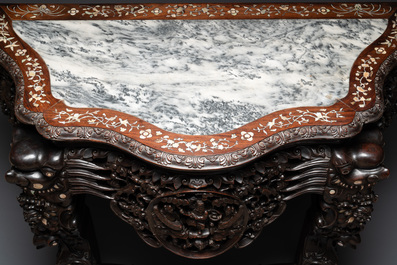 A finely carved Chinese hongmu console table with marble top and mother-of-pearl inlay, Canton, 19th C.