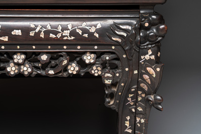 A Chinese mother-of-pearl-inlaid hongmu reclining armchair and retractable footrest, Canton, 19th C.