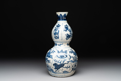 A Chinese blue and white 'flying horse' double gourd vase, Wanli