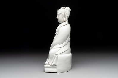 A Chinese Dehua blanc de Chine figure of Wenchang, 20th C.