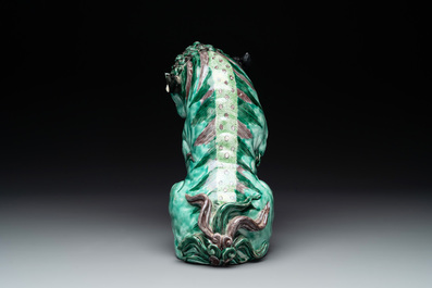 A Chinese verte biscuit group of a Buddhist lion with cub, 19th C.