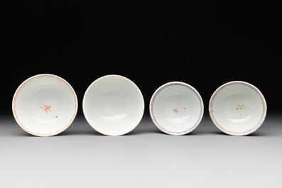 Two Chinese famille rose teapots, four cups and two saucers, Qianlong