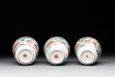 A set of 12 Chinese famille verte cups and saucers with floral design, Kangxi