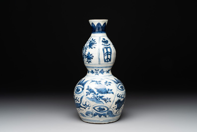 A Chinese blue and white 'flying horse' double gourd vase, Wanli