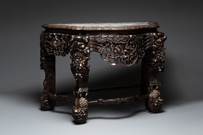 A finely carved Chinese hongmu console table with marble top and mother-of-pearl inlay, Canton, 19th C.