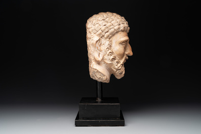 A large terracotta head of a bearded man, Gandhara region, Kushan period, 4/5th C.