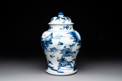 A Chinese blue and white 'Mongolian hunt' vase and cover, Kangxi