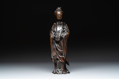 A Chinese bronze Guanyin holding a ruyi, 17/18th C.