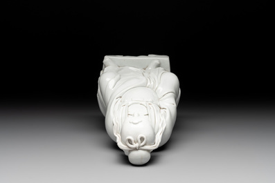 A Chinese Dehua blanc de Chine figure of Wenchang, 20th C.
