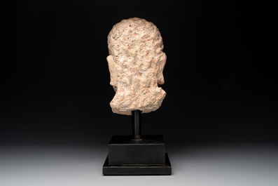 A large terracotta head of a bearded man, Gandhara region, Kushan period, 4/5th C.