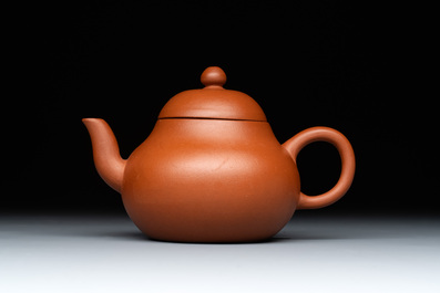 A Chinese Yixing stoneware teapot and cover, signed Mengchen 孟辰, 19th C.