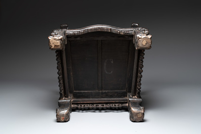 A Chinese richly carved and lacquered hongmu armchair, Canton, 19th C.