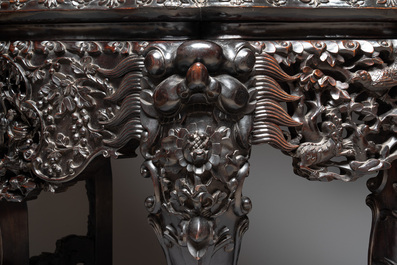 A finely carved Chinese hongmu console table with marble top, Canton, 19th C.