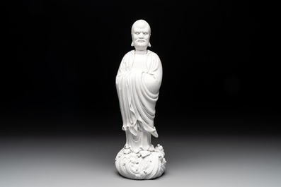 A Chinese Dehua blanc de Chine figure of Dharma, He Chaozong 何朝宗 and Dehua 德化 mark, Republic