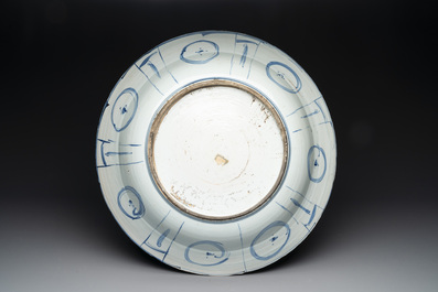 A large Chinese blue and white 'kraak' dish with geese among lotus flowers, Wanli