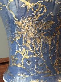 A Chinese gilt-decorated powder-blue vase with a phoenix among blossoming branches, Qianlong