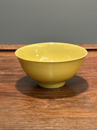 A pair of Chinese yellow-glazed bowls, Yongzheng mark, 19th C.