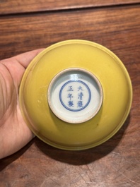 A pair of Chinese yellow-glazed bowls, Yongzheng mark, 19th C.