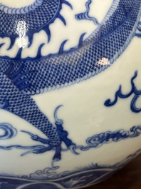 A Chinese blue and white 'dragon' bottle vase, Yongzheng mark, 19th C.
