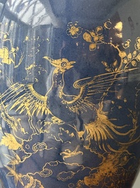 A Chinese gilt-decorated powder-blue vase with a phoenix among blossoming branches, Qianlong