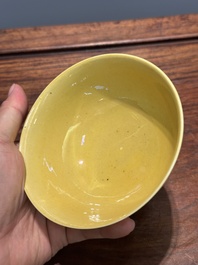 A pair of Chinese yellow-glazed bowls, Yongzheng mark, 19th C.