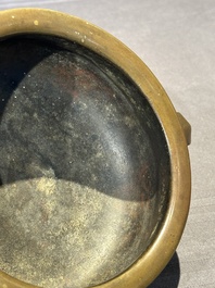 A Chinese bronze elephant-head-handled censer, Wan Shou Wu Jiang 萬壽無疆 mark, 19th C.