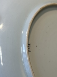 A Chinese famille verte caf&eacute;-au-lait ground plate and a white-glazed plate, Kangxi